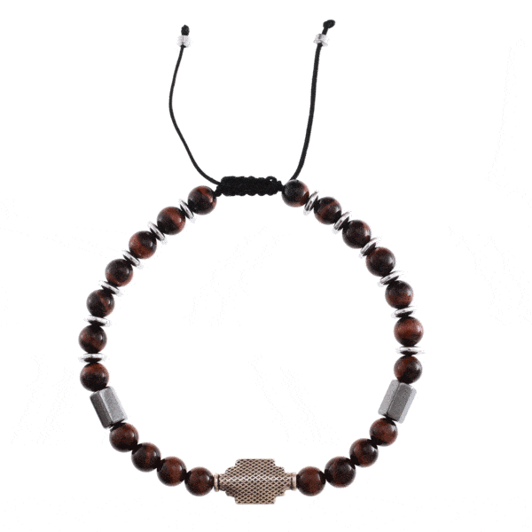 Handmade macrame bracelet with natural red Tiger Eye and Hematite gemstones, threaded on a black string. The bracelet has a decorative sterling silver element on the center. Buy online shop.