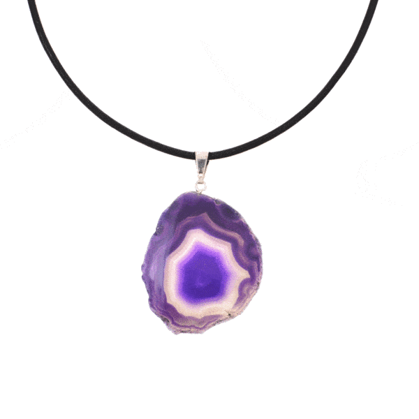 Natural agate gemstone pendant, artificially colored and polished on both sides. The agate has a silver plated hypoallergenic metal ring and it is threaded on a black leather with sterling silver clasp. Buy online shop.