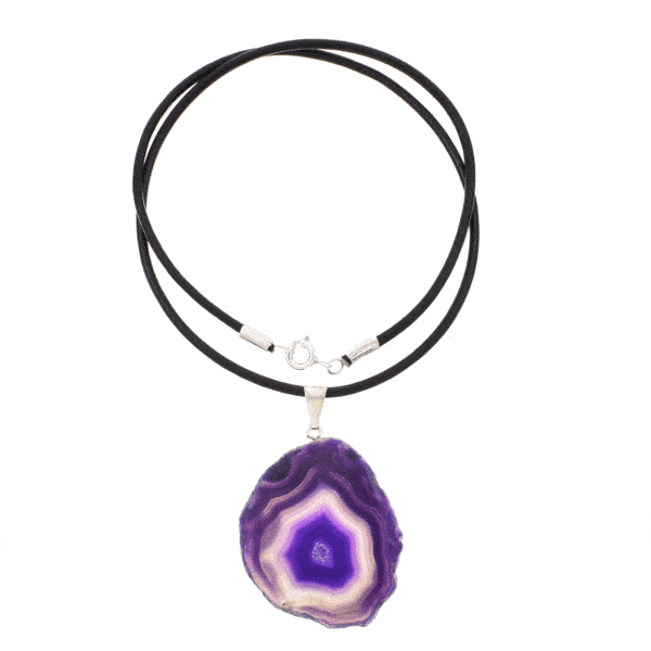 Natural agate gemstone pendant, artificially colored and polished on both sides. The agate has a silver plated hypoallergenic metal ring and it is threaded on a black leather with sterling silver clasp. Buy online shop.