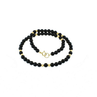 Handmade necklace with natural onyx gemstones and decorative elements made of gold plated sterling silver. Buy online shop.
