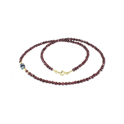 Handmade necklace with natural Garnet and Apatite gemstones and decorative elements made of gold plated sterling silver. Buy online shop.