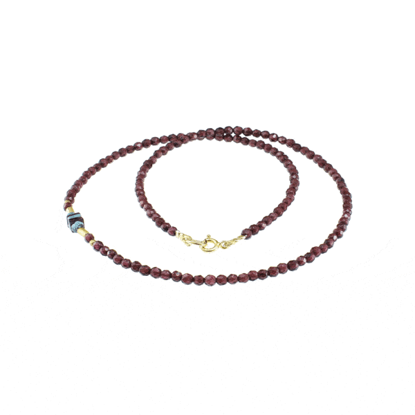 Handmade necklace with natural Garnet and Apatite gemstones and decorative elements made of gold plated sterling silver. Buy online shop.