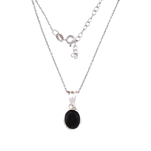 Handmade pendant made of sterling silver and natural Onyx gemstone in an oval shape. The pendant is threaded on a sterling silver chain.Buy online shop.