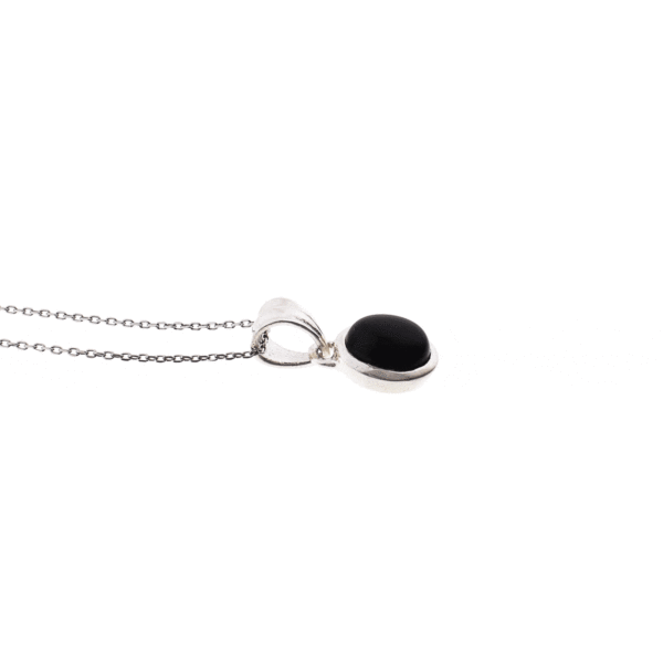 Handmade pendant made of sterling silver and natural onyx gemstone in an oval shape. The pendant is threaded on a sterling silver chain with adjustable length. Buy online shop.