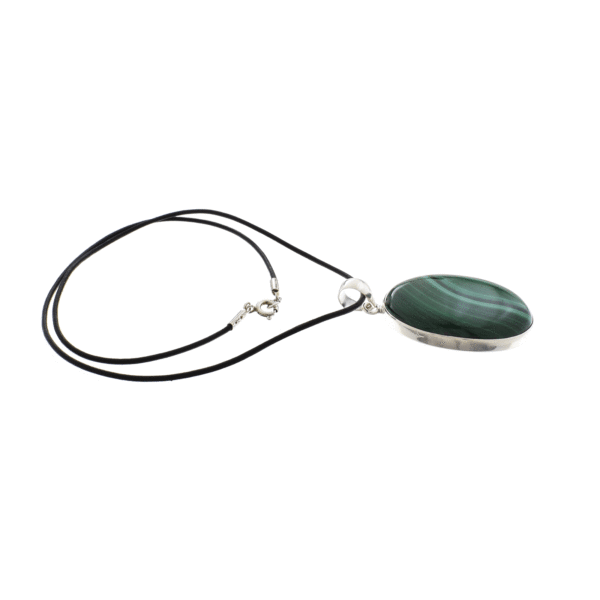 Handmade pendant made of sterling silver and natural malachite gemstone, in an oval shape. The pendant is threaded on a black leather with sterling silver clasp. Buy online shop.