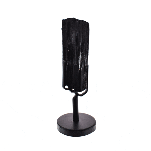 Rough natural black tourmaline gemstone, set on a sleek black metal base, with a total height of 23cm.