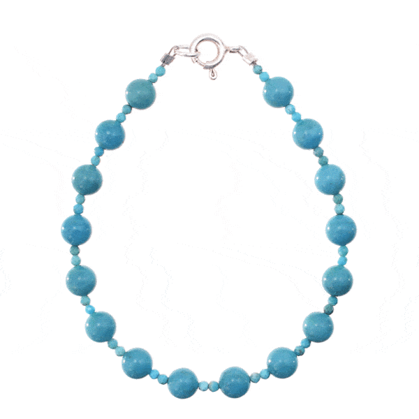 Handmade bracelet with natural turquoise gemstones in a spherical shape and sterling silver clasp. Buy online shop.