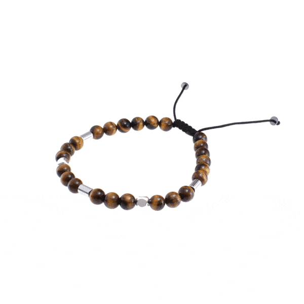 Handmade macrame bracelet with natural Tiger Eye and Hematite gemstones, threaded on a black string. The bracelet has decorative elements made of sterling silver. Buy online shop.