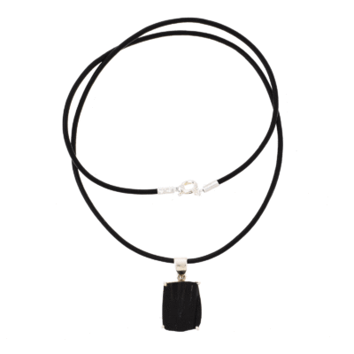 Handmade pendant made of sterling silver and natural black tourmaline gemstone, in a parallelogram shape. The pendant is threaded on a black leather with sterling silver clasp. Buy online shop.