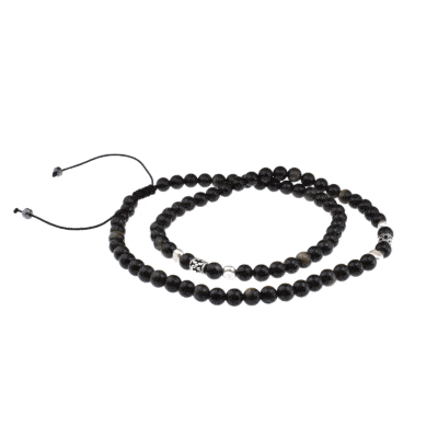 Handmade macrame necklace with natural Obsidian gemstones, threaded on a black string. The necklace is decorated with elements made of sterling silver. Buy online shop.