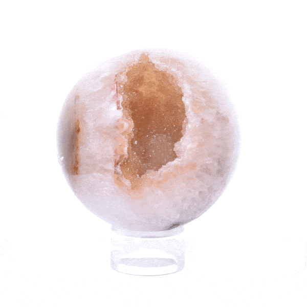 Sphere made of natural agate gemstone with crystal quartz and a diameter of 8cm. The sphere is placed on a transparent base (plexiglass). Buy online shop.