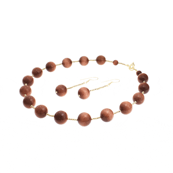 Handmade necklace and earrings set with Goldstone, Pyrite and details made of gold plated sterling silver. Buy online shop.