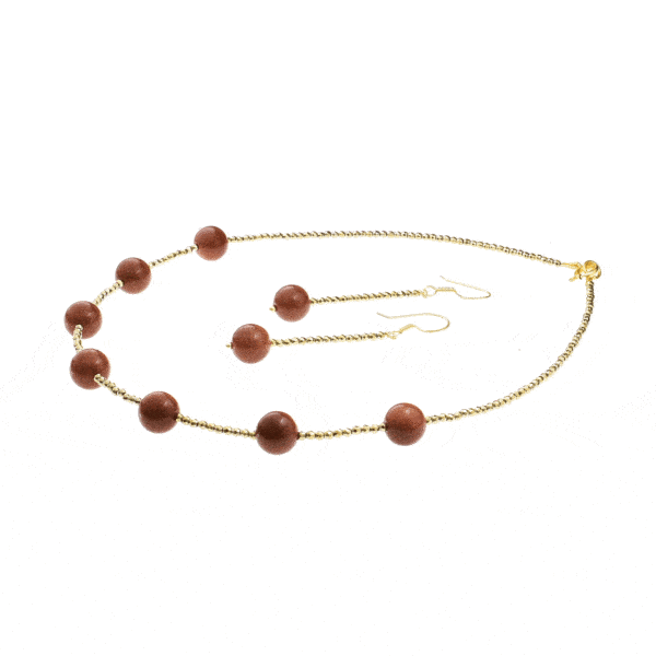 Handmade necklace and earrings set with Goldstone, Pyrite and details made of gold plated sterling silver. Buy online shop.