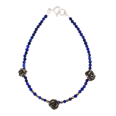 Handmade bracelet with Lapis Lazuli and Pyrite gemstones and decorative flowers made of Pyrite. The bracelet has a sterling silver clasp. Buy online shop.