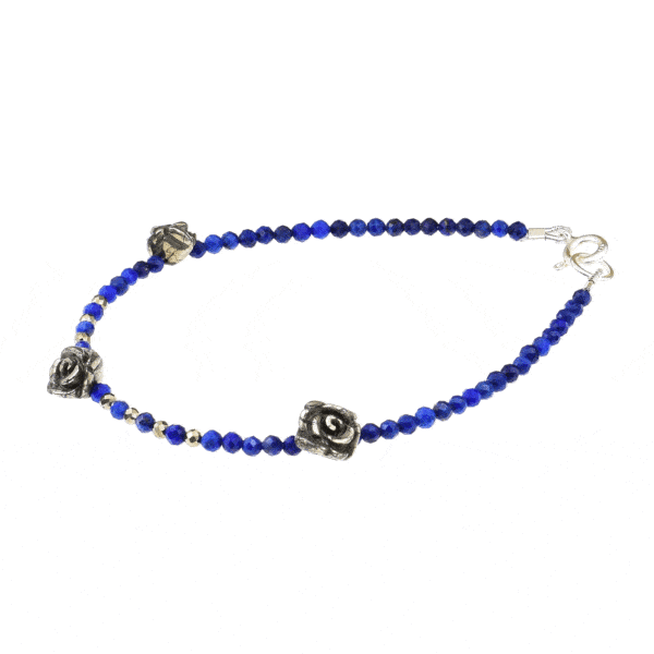 Handmade bracelet with Lapis Lazuli and Pyrite gemstones and decorative flowers made of Pyrite. The bracelet has a sterling silver clasp. Buy online shop.