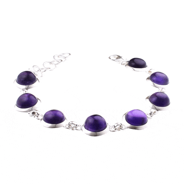 Handmade bracelet made of sterling silver and natural Amethyst gemstones in a round shape. The bracelet has adaptable lengths. The minimum length is 20cm and the maximum length is 23.5cm. Buy online shop.