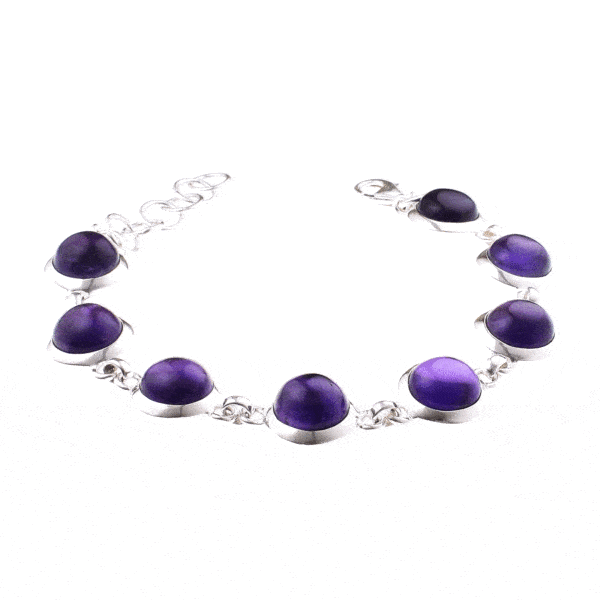 Handmade bracelet made of sterling silver and natural Amethyst gemstones in a round shape. The bracelet has adaptable lengths. The minimum length is 20cm and the maximum length is 23.5cm. Buy online shop.