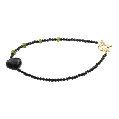 Handmade bracelet with natural black Spinel and Diopside gemstones. The bracelet has a heart made of Obsidian gemstone and gold plated sterling silver clasp. Buy online shop.