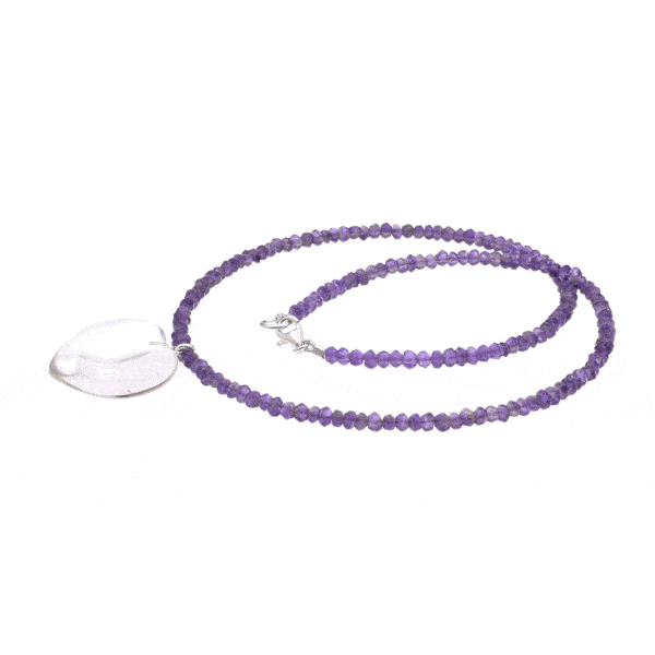 Handmade necklace with natural Amethyst gemstones, one Crystal quartz pendant in a heart shape and sterling silver clasp. Buy online shop.