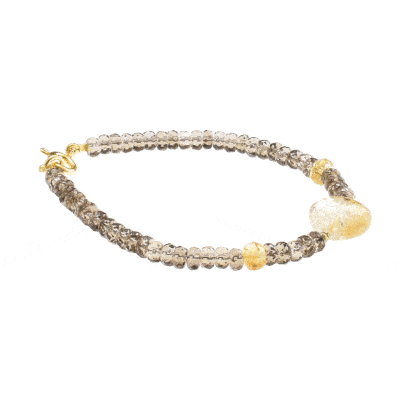 Handmade bracelet with natural, faceted, rondel shaped smoky quartz and citrine quartz gemstones. The bracelet has one citrine quartz gemstone heart in the center and gold plated sterling silver clasp.