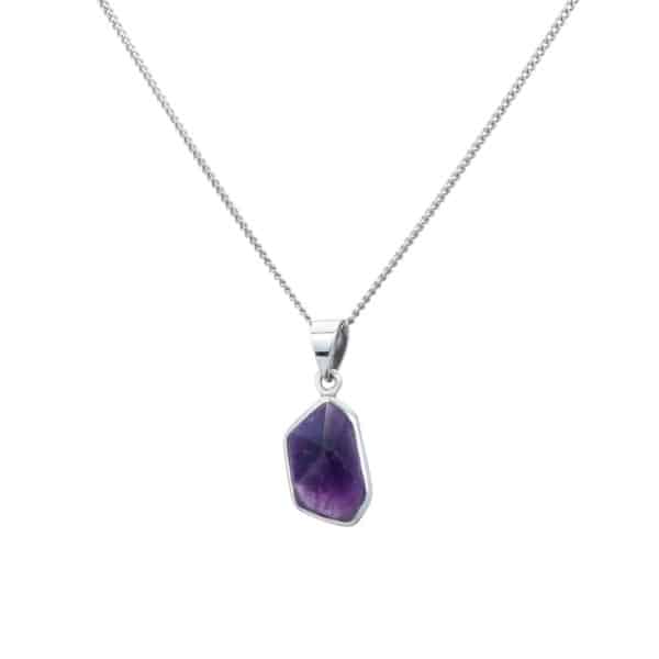 Pendant made of sterling silver and natural raw amethyst crystal. The pendant is threaded on a sterling silver chain. Buy online shop.