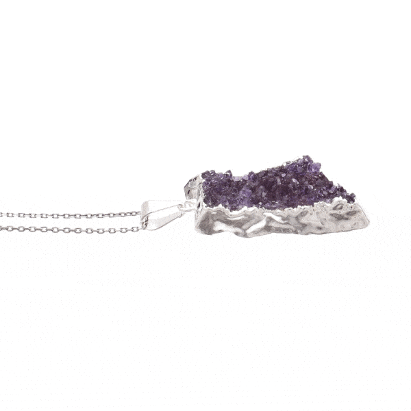 Pendant made of hypoallergenic silver plated metal and amethyst gemstone in a natural form. The pendant is threaded on a sterling silver chain with adjustable length. Buy online shop.