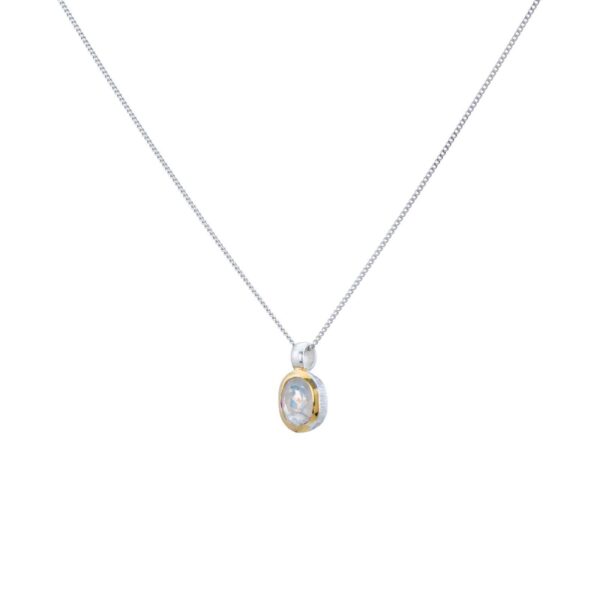 Handmade pendant made of sterling silver with gold plated outline and natural white labradorite gemstone, in an oval shape. The pendant is threaded on a sterling silver chain. Buy online shop.