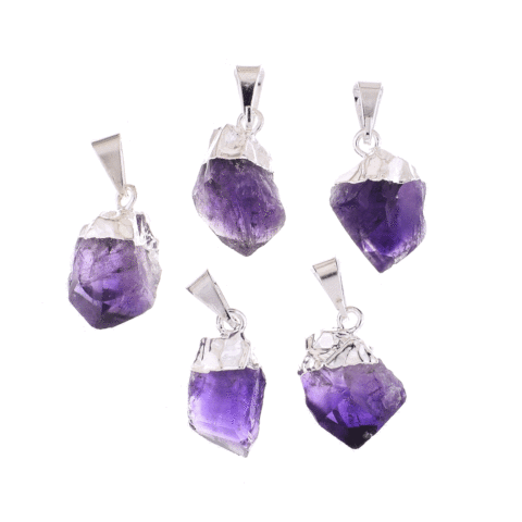 Pendants made of silver plated hypoallergenic metal and natural amethyst crystals in a rough form. Buy online shop.