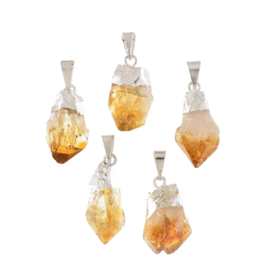 Pendants made of silver plated hypoallergenic metal and natural citrine quartz crystals in a rough form. Buy Online shop.