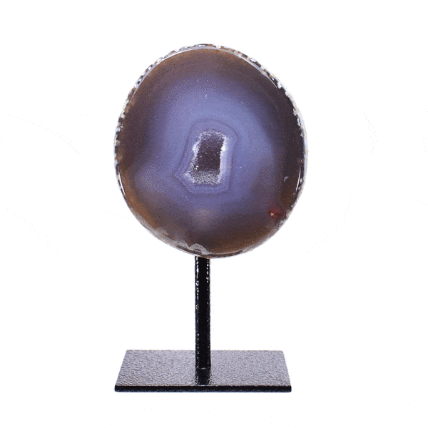 Natural agate geode gemstone with crystal quartz inside. The geode is embedded into a black, metallic base and the product has a height of 13.5cm. Buy online shop.