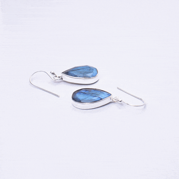 Handmade earrings made of sterling silver and natural, faceted labradorite gemstone in a teardrop shape. Buy online shop.