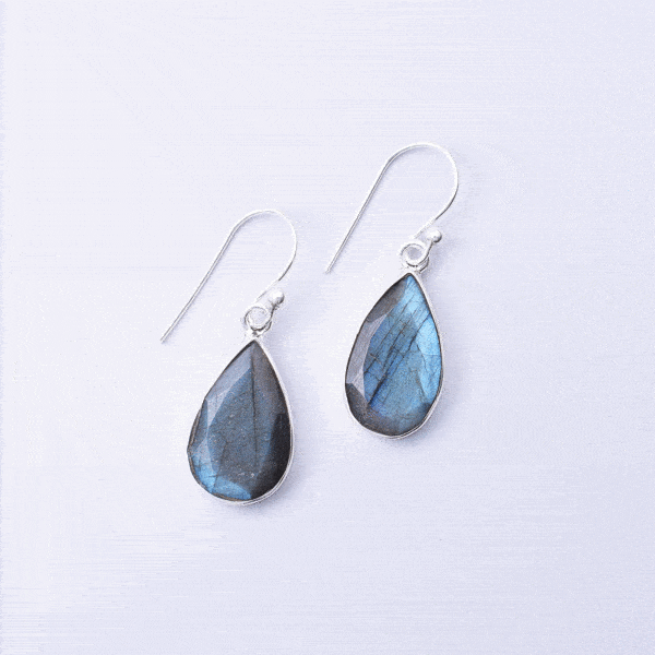 Handmade earrings made of sterling silver and natural, faceted labradorite gemstone in a teardrop shape. Buy online shop.