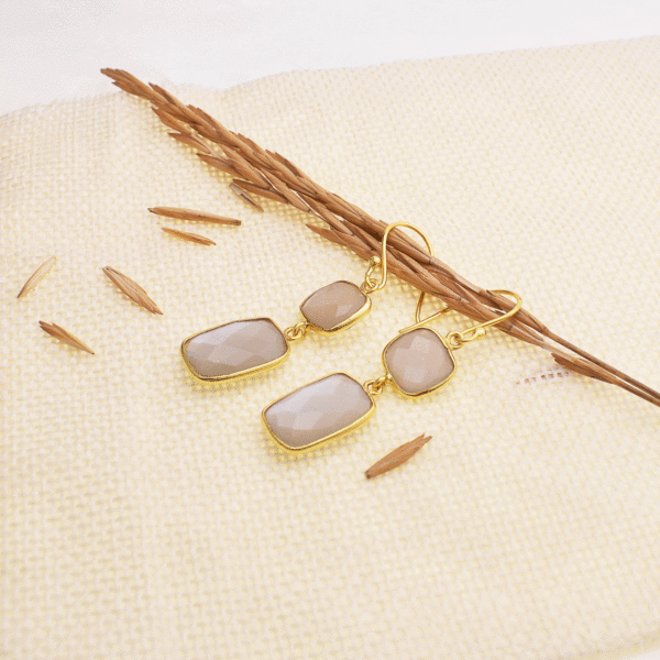 Handmade, long earrings made of gold plated sterling silver and natural, faceted grey moonstone in a square and parallelogram shape. Buy online shop.