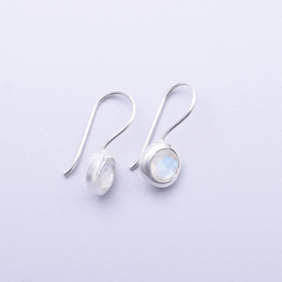 Handmade earrings made of sterling silver and natural, faceted white labradorite gemstone in a round shape. Buy online shop.