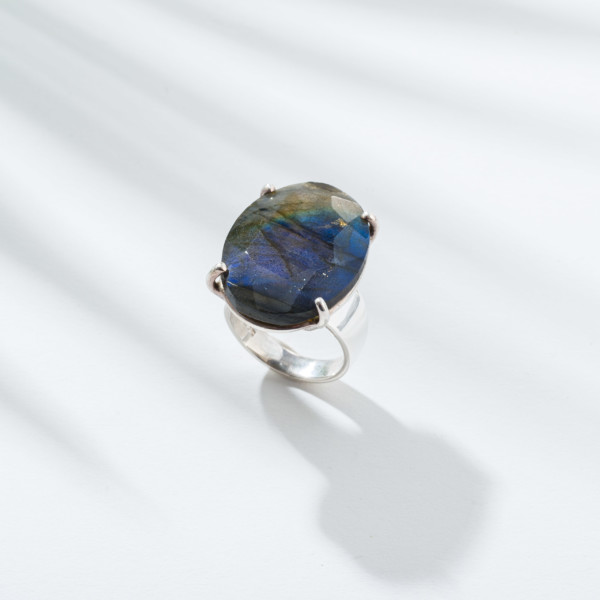 Handmade ring made of sterling silver and natural labradorite gemstone in an oval shape.Buy online shop.