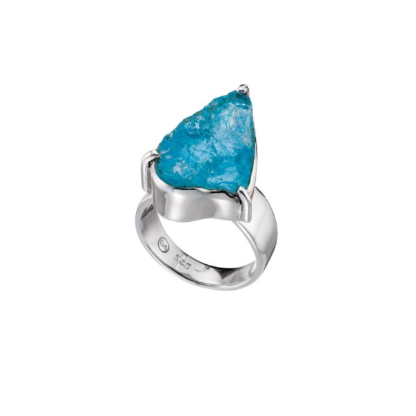 Handmade ring made of sterling silver and natural blue topaz gemstone in a rough form. Buy online shop.
