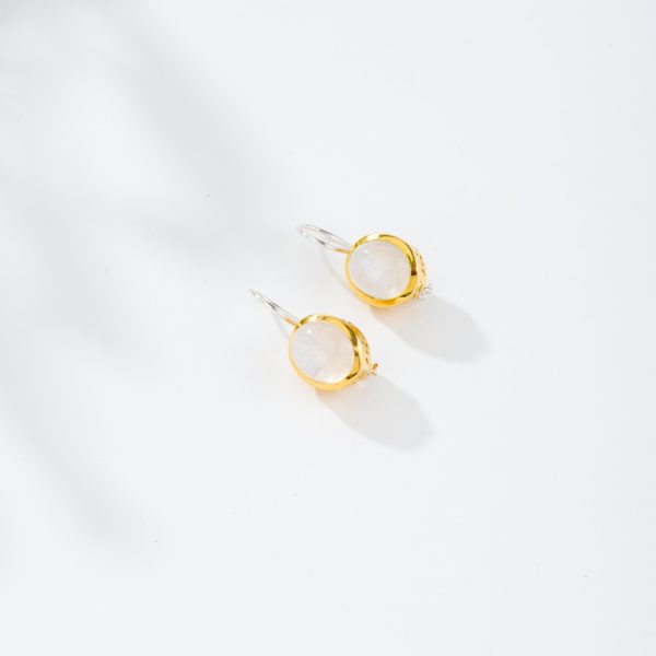 Handmade earrings made of sterling silver with gold plated outline and natural white labradorite gemstone in an oval shape. Buy online shop.