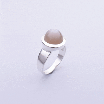 Handmade ring made of sterling silver and natural grey moonstone in a round shape. Buy online shop.