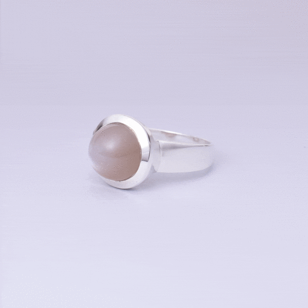 Handmade ring made of sterling silver and natural grey moonstone in a round shape. Buy online shop.