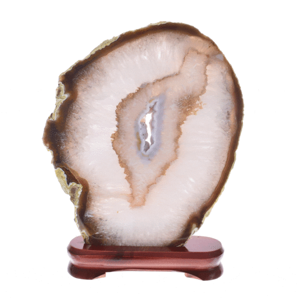 Slice of natural agate gemstone with crystal quartz, placed on a wooden base. The agate is polished on both sides and it has a height of 29cm. Buy online shop.