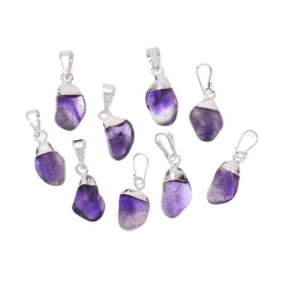 Pendants made of silver plated hypoallergenic metal and natural polished amethyst crystals. Buy online shop.
