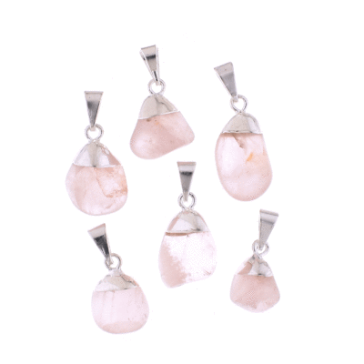 Pendants made of silver plated hypoallergenic metal and natural polished rose quartz crystals. Buy online shop.