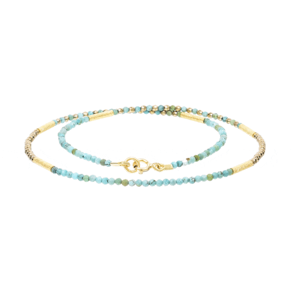 Handmade necklace with natural turquoise and pyrite gemstones and decorative elements made of gold plated sterling silver. Buy online shop.