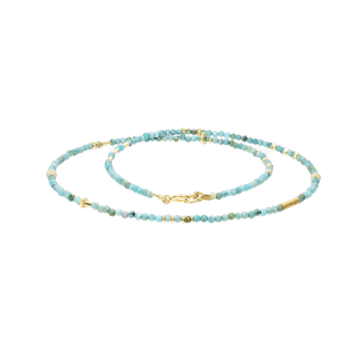 Handmade necklace with natural turquoise gemstones and decorative elements made of gold plated sterling silver. Buy online shop.