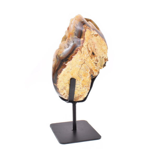 Natural agate geode gemstone with crystal quartz and polished outline. The geode comes with a black, metallic base and the product has a height of 19.5cm. Buy online shop.