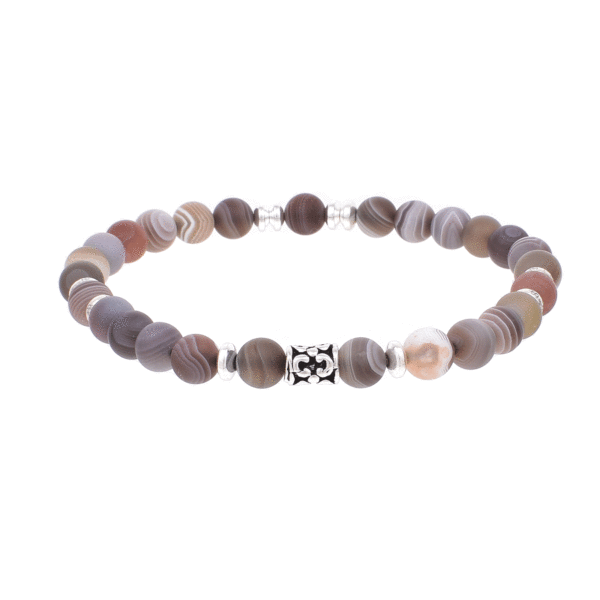 Handmade bracelet with natural botswana agate and hematite gemstones, threaded on a special elastic. The bracelet is decorated with sterling silver elements.Buy online shop.
