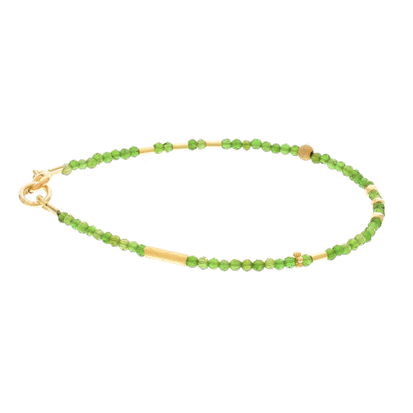 Handmade bracelet with natural diopside gemstones and decorative elements made of gold plated sterling silver. Buy online shop.
