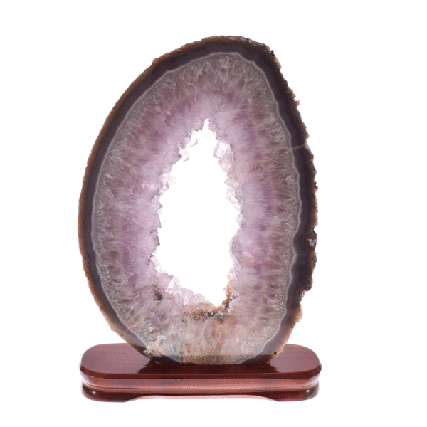 Slice of natural agate gemstone with amethyst crystals, placed on a wooden base. The agate is polished on both sides and it has a height of 40cm. Buy online shop.