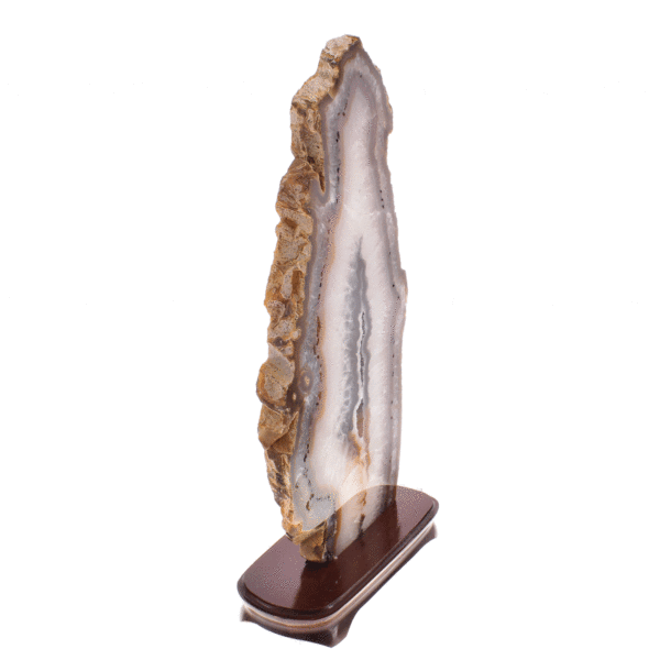 Slice of natural agate gemstone with crystal quartz, placed on a wooden base. The agate is polished on both sides and it has a height of 44cm. Buy online shop.