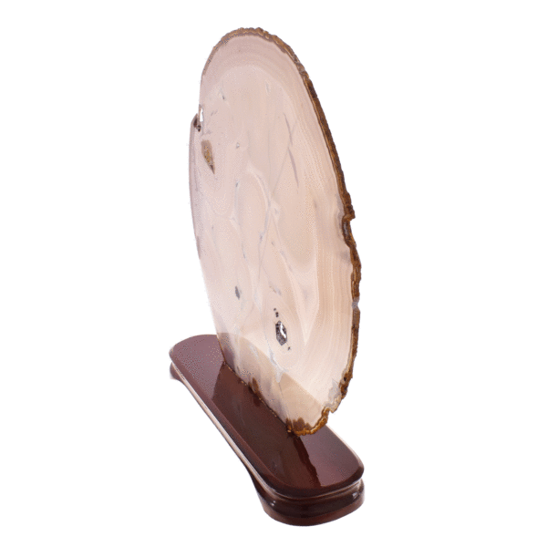 Polished slice of natural agate gemstone, placed on a wooden base. The Agate has a height of 35cm. Buy online shop.